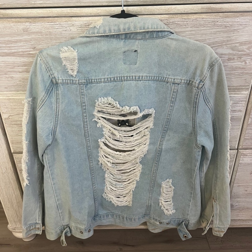 Distressed jean jacket